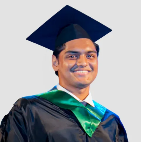 Azraf Wasir in graduation cap and gown